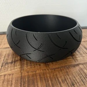 Svuotatasche a forma di pneumatico da moto